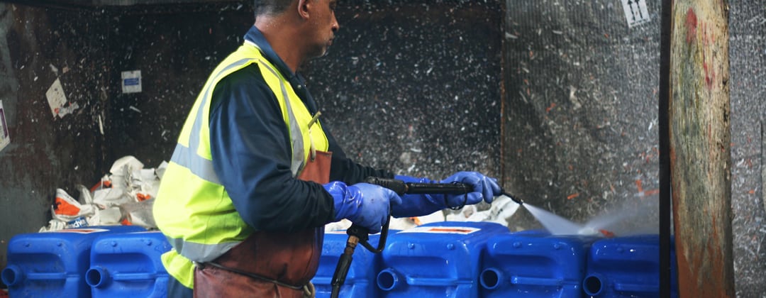 chemical bottles being cleaned